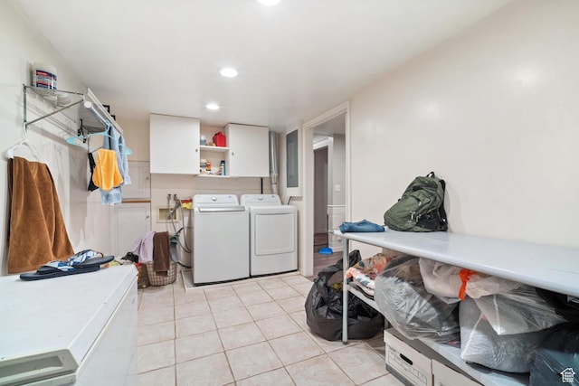1975 Laguna Vista Dr, Orem, UT 84058 - clothes washing area with cabinets, electric panel, washer and clothes dryer, and light tile patterned floors