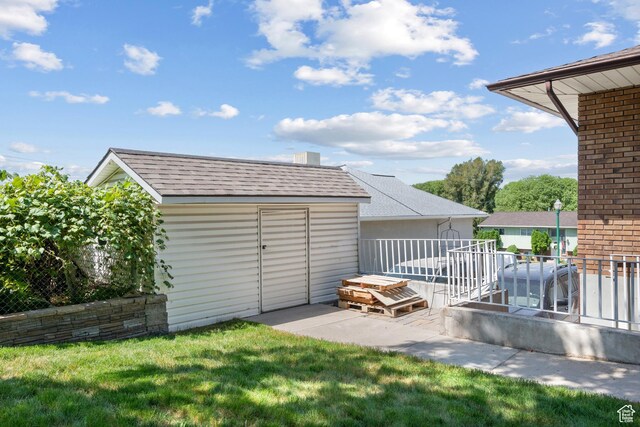 1975 Laguna Vista Dr, Orem, UT 84058 - garage featuring a storage unit
