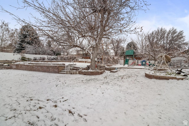 1975 Laguna Vista Dr, Orem, UT 84058 - snowy yard with a playground