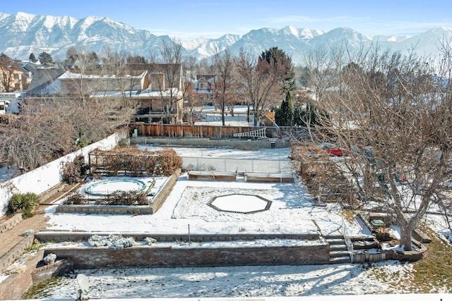 1975 Laguna Vista Dr, Orem, UT 84058 - yard layered in snow with a mountain view