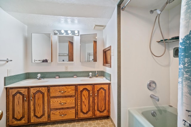 1975 Laguna Vista Dr, Orem, UT 84058 - bathroom featuring vanity, a textured ceiling, and shower / bath combo with shower curtain