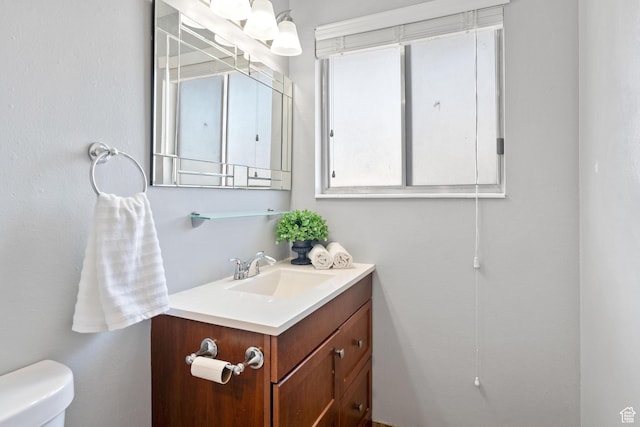 9737 S Stonehaven St, South Jordan, UT 84009 - bathroom featuring vanity and toilet