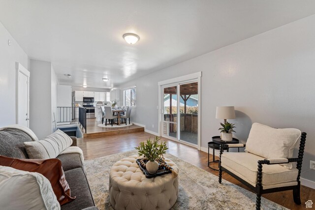 9737 S Stonehaven St, South Jordan, UT 84009 - living room with light hardwood / wood-style flooring