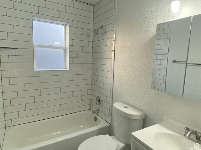 458 E Lambourne Ave, Salt Lake City, UT 84115 - full bathroom featuring tiled shower / bath, vanity, and toilet