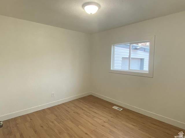 458 E Lambourne Ave, Salt Lake City, UT 84115 - unfurnished room with light wood-type flooring