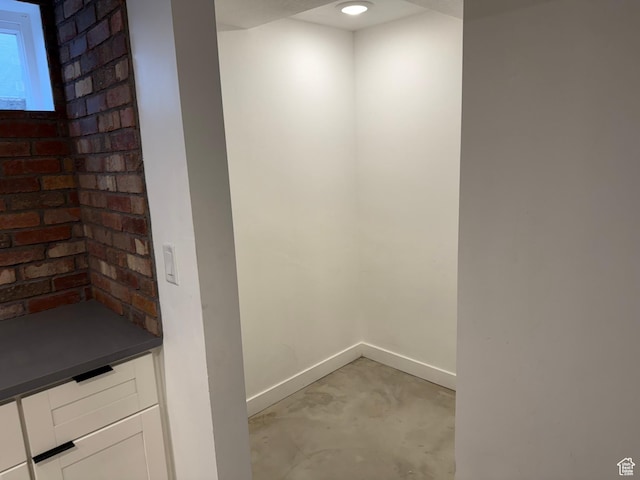 interior space featuring concrete flooring