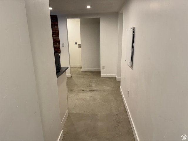 corridor with concrete floors