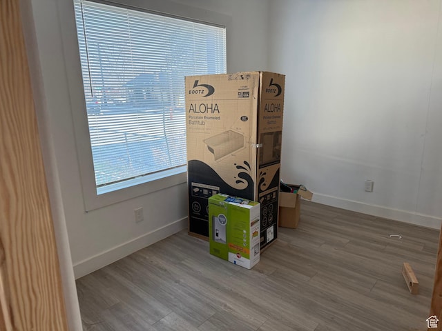 misc room with wood-type flooring