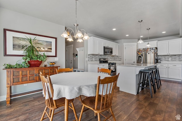 3937 W 1850 N, Lehi, UT 84043 - dining space with an inviting chandelier, sink, and dark hardwood / wood-style floors
