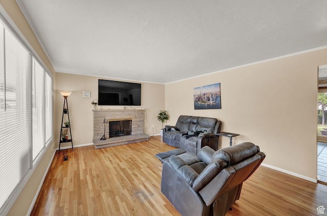 927 E 5650 S, Murray, UT 84121 - living room with ornamental molding, wood-type flooring, and a stone fireplace