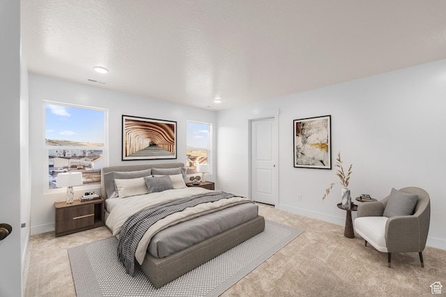 1636 W Onyx Dr Unit 217, Santaquin, UT 84655 - bedroom with light carpet and baseboards