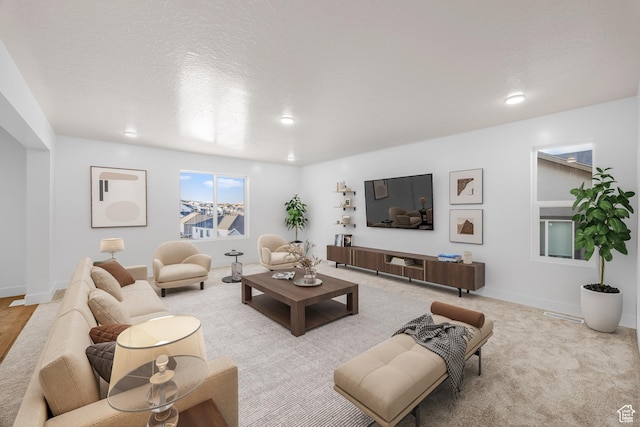 1636 W Onyx Dr Unit 217, Santaquin, UT 84655 - carpeted living room with baseboards