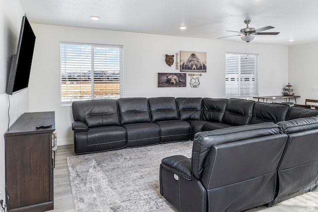 156 E Sailors Way Unit 11, Garden City, UT 84028 - living room with ceiling fan and light hardwood / wood-style flooring