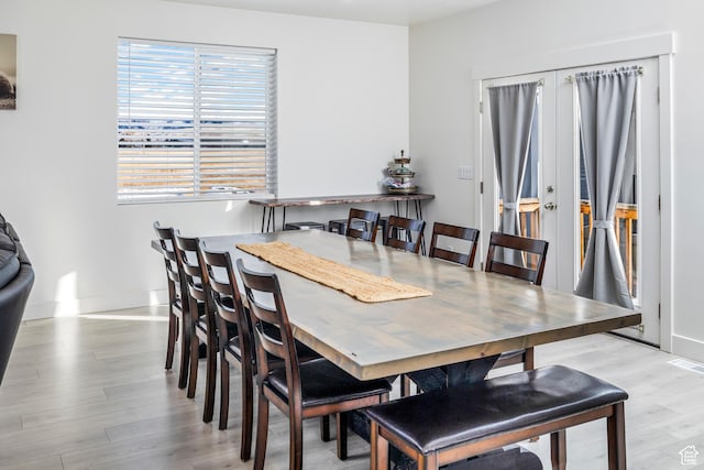 156 E Sailors Way Unit 11, Garden City, UT 84028 - dining area featuring light wood-type flooring