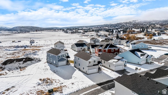 156 E Sailors Way Unit 11, Garden City, UT 84028 - snowy aerial view featuring a mountain view