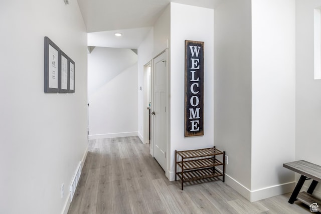 156 E Sailors Way Unit 11, Garden City, UT 84028 - hallway with light wood-type flooring
