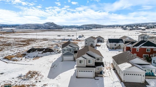 156 E Sailors Way Unit 11, Garden City, UT 84028 - snowy aerial view featuring a mountain view