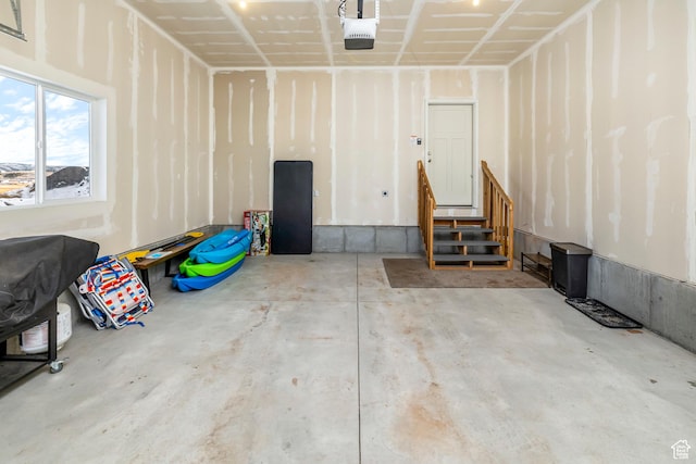 156 E Sailors Way Unit 11, Garden City, UT 84028 - garage with a garage door opener