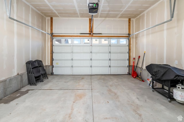 156 E Sailors Way Unit 11, Garden City, UT 84028 - garage with a garage door opener