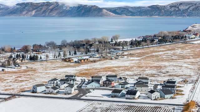 156 E Sailors Way Unit 11, Garden City, UT 84028 - snowy aerial view featuring a water and mountain view