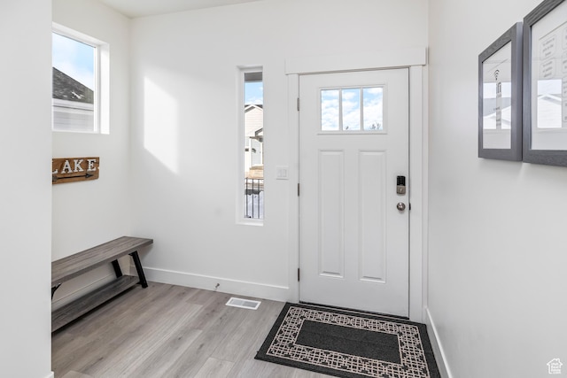 156 E Sailors Way Unit 11, Garden City, UT 84028 - entrance foyer with light hardwood / wood-style floors