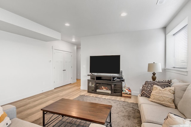 4024 W 2875 N, Plain City, UT 84404 - living room with light wood-type flooring, recessed lighting, and baseboards