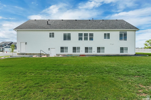 4024 W 2875 N, Plain City, UT 84404 - back of house with a lawn and roof with shingles