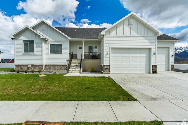 4024 W 2875 N, Plain City, UT 84404 - view of front of house with board and batten siding, an attached garage, stone siding, and concrete driveway