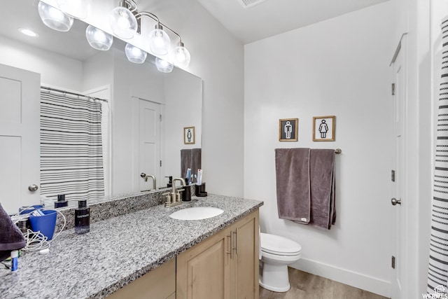 4024 W 2875 N, Plain City, UT 84404 - bathroom featuring wood finished floors, vanity, toilet, and a shower with curtain