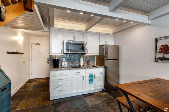 2325 Sidewinder Dr Unit 821, Park City, UT 84060 - kitchen featuring stainless steel appliances, light stone countertops, wooden ceiling, and beam ceiling