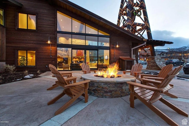 2325 Sidewinder Dr Unit 821, Park City, UT 84060 - exterior space featuring a mountain view, a patio area, and a fire pit