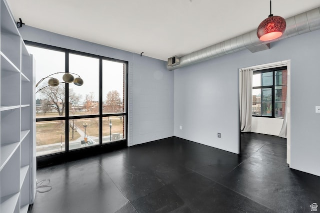 spare room with plenty of natural light