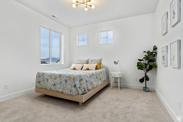 3559 S Garibaldi Way, Saratoga Springs, UT 84045 - carpeted bedroom featuring a notable chandelier