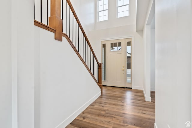 3559 S Garibaldi Way, Saratoga Springs, UT 84045 - entryway with light hardwood / wood-style floors and a high ceiling