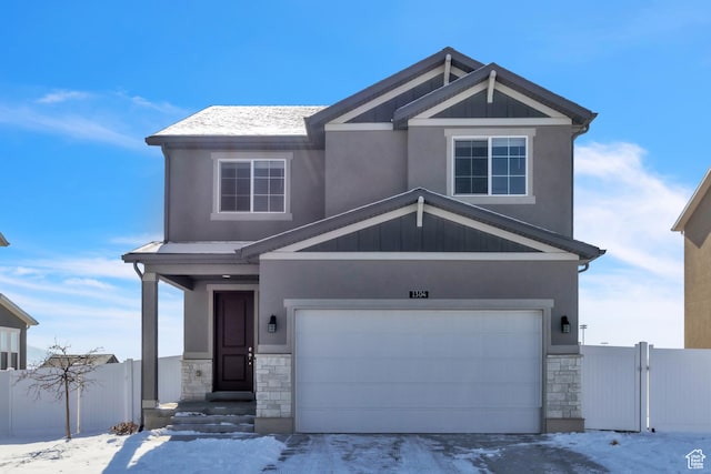 craftsman inspired home with a garage