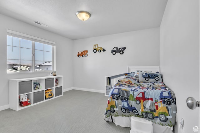 bedroom featuring carpet