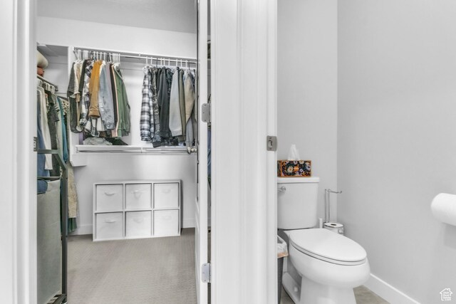 bathroom featuring toilet