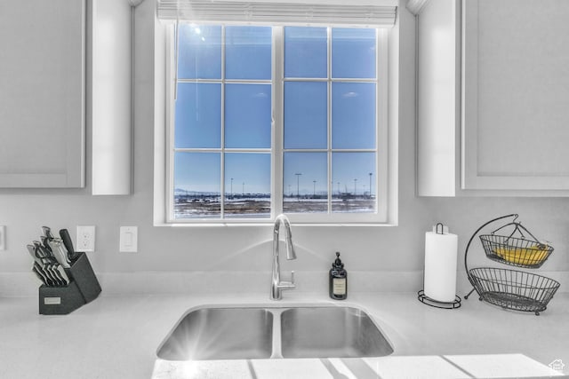 details with sink and white cabinets