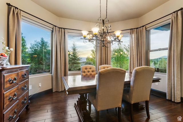 3180 E Stoney Creek Cir S, Heber City, UT 84032 - dining room with a chandelier, dark wood finished floors, and baseboards