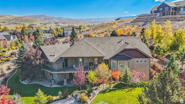 3180 E Stoney Creek Cir S, Heber City, UT 84032 - aerial perspective of suburban area with a mountain backdrop