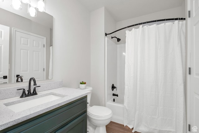 110 Jefferson Ave, Ogden, UT 84404 - full bath with vanity, toilet, wood finished floors, and shower / tub combo