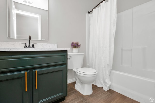 110 Jefferson Ave, Ogden, UT 84404 - bathroom with wood finished floors, toilet, vanity, and shower / bath combination with curtain