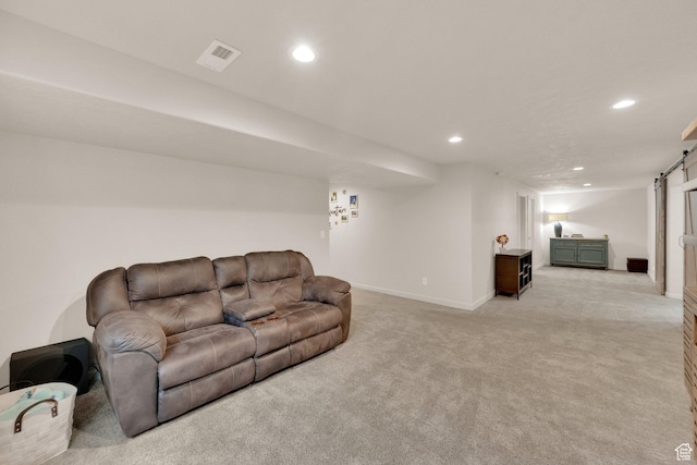 1054 S 1050 W, Tooele, UT 84074 - living room featuring recessed lighting, light carpet, baseboards, and a barn door