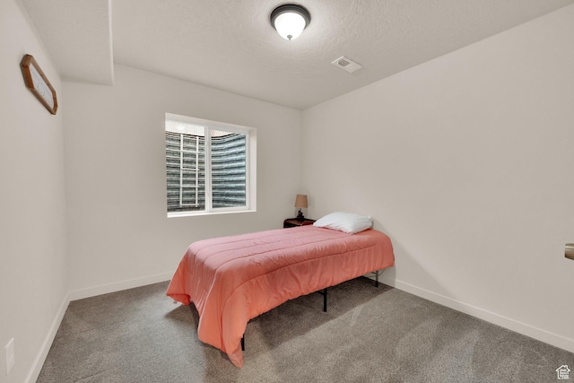1054 S 1050 W, Tooele, UT 84074 - bedroom with carpet, baseboards, and a textured ceiling