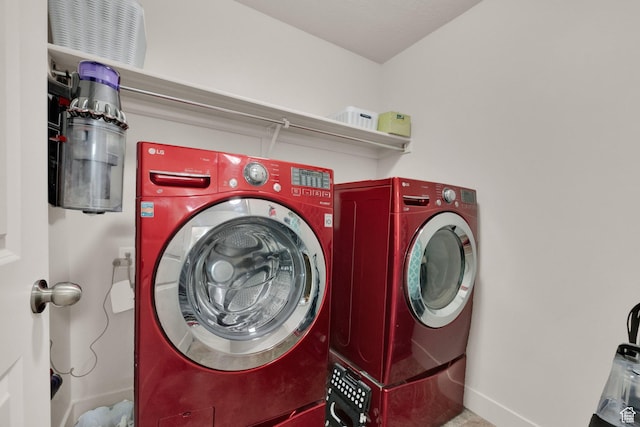 1054 S 1050 W, Tooele, UT 84074 - laundry area with washer and clothes dryer and baseboards