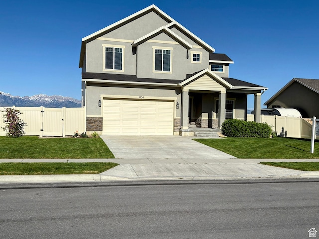 1054 S 1050 W, Tooele, UT 84074 - craftsman-style house featuring a gate, stone siding, stucco siding, a garage, and concrete driveway