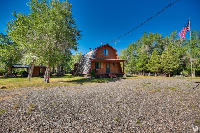 2690 E Hwy 153, Beaver, UT 84713 - view of front of house featuring a front lawn and covered porch