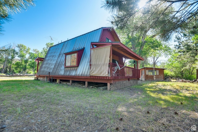 2690 E Hwy 153, Beaver, UT 84713 - exterior space with a wooden deck, a lawn, and an outdoor structure