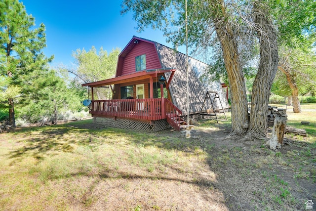 2690 E Hwy 153, Beaver, UT 84713 - view of front of home with a wooden deck and a front lawn