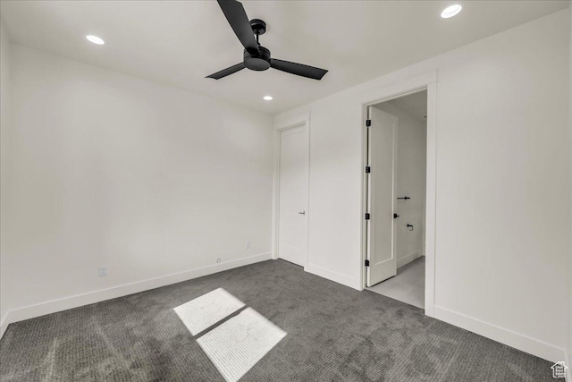 5367 W 3180 S, Hurricane, UT 84737 - unfurnished bedroom featuring ceiling fan and dark colored carpet